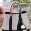 Canvas/black leather (silver hardware)