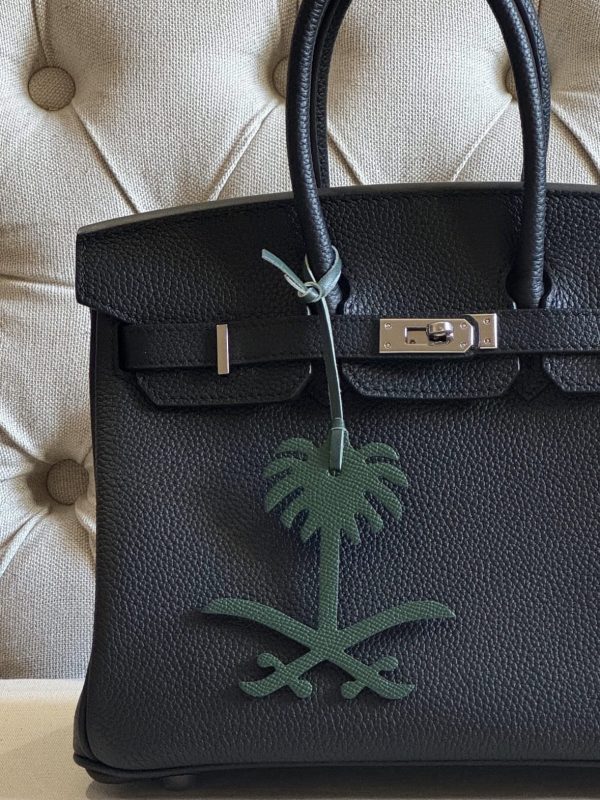 KSA palm charm