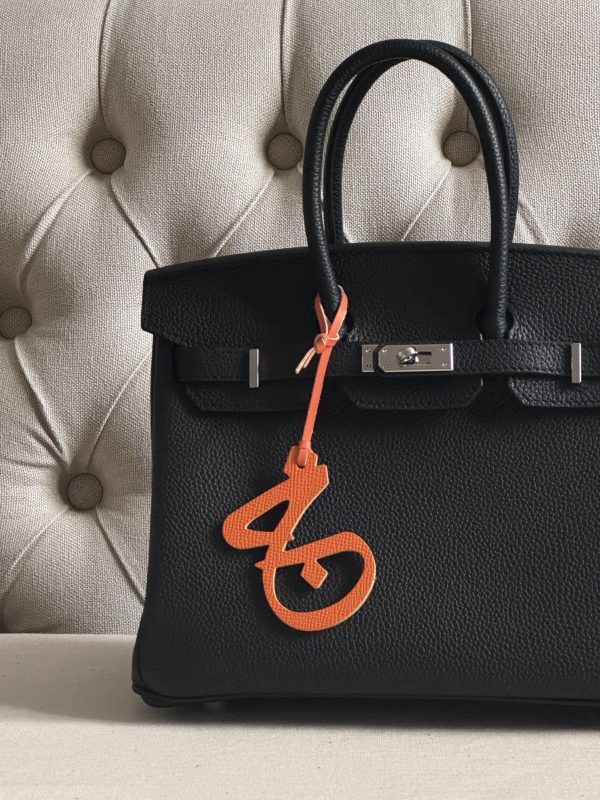 Letter (ج) charm