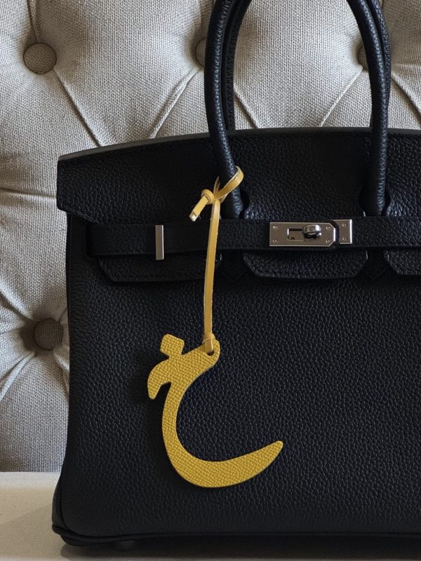 Letter (خ) charm