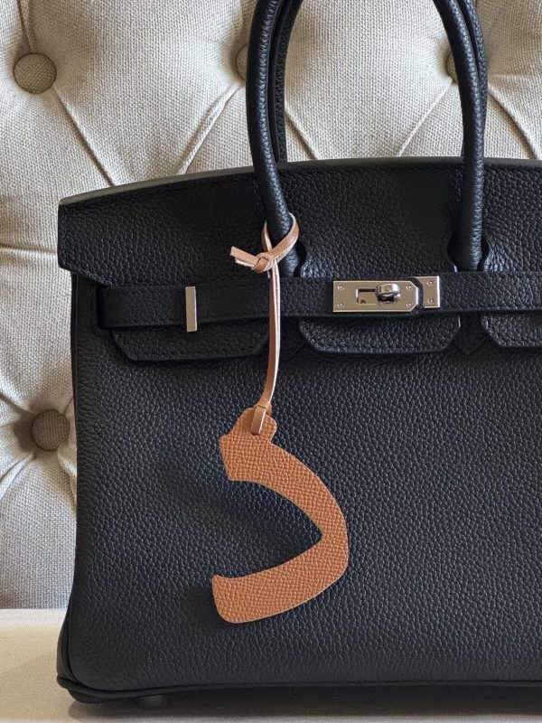 Letter (د) charm