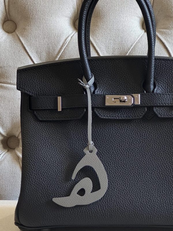 Letter (هـ) charm