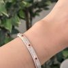 Silver with (pink stones)